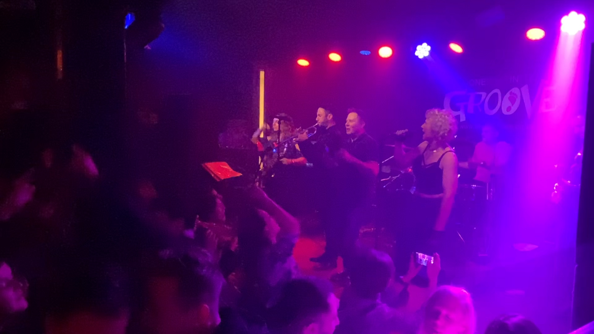 Live band playing gig in a night club